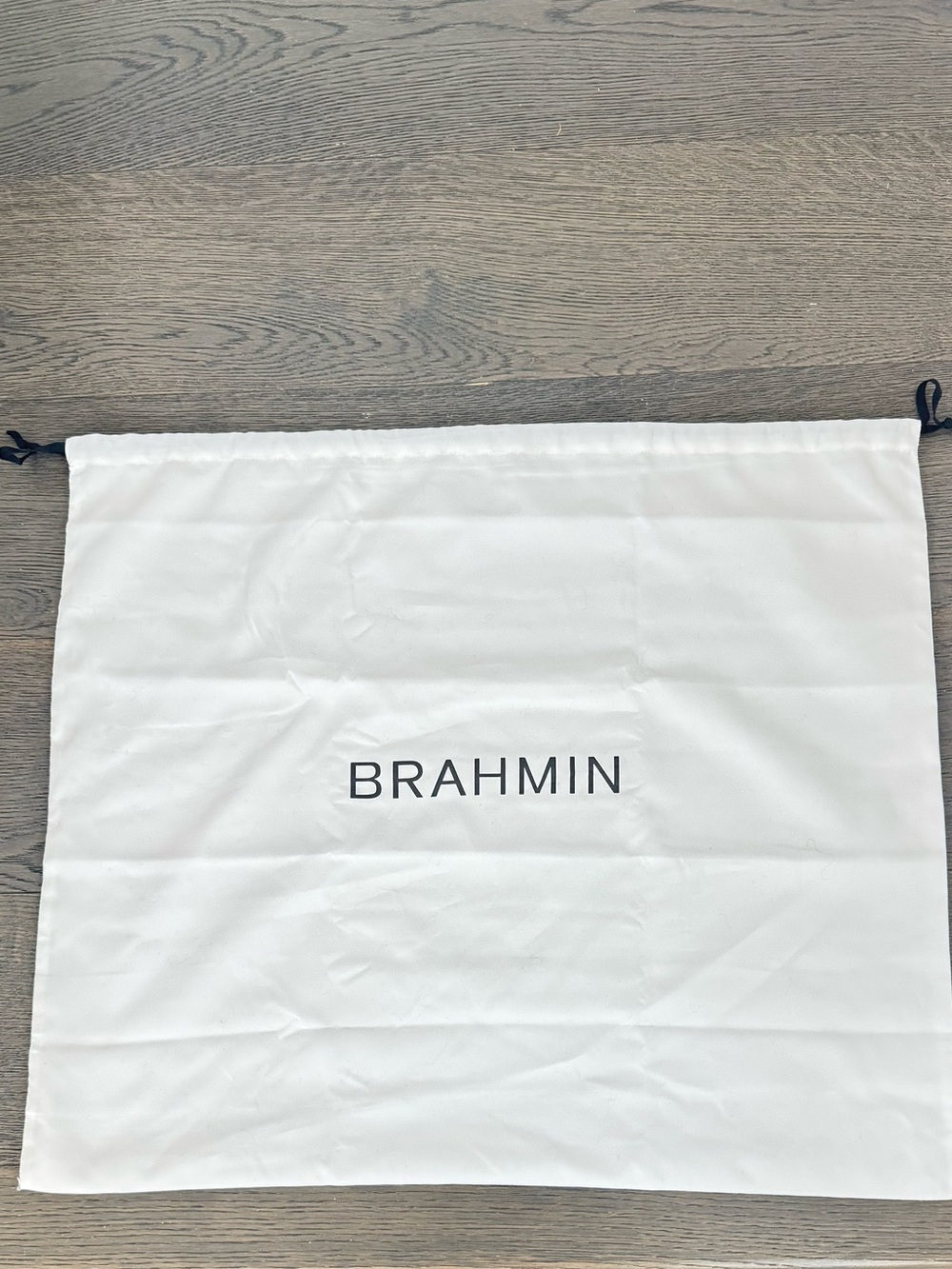 Brahmin medium sided dust bag. Like new!